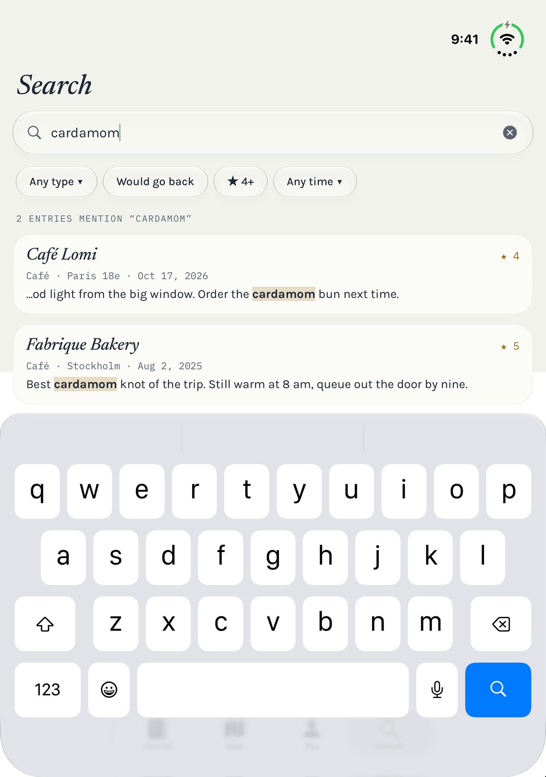 Searching on an open iPhone Duo with the keyboard on the lower half.